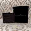 The DeepGrid Hand-Tooled Leather Bi-Fold Wallet - Escaro Royale